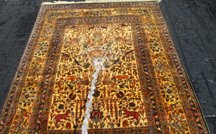 alfombra de pura seda hereke turca inmersion en agua